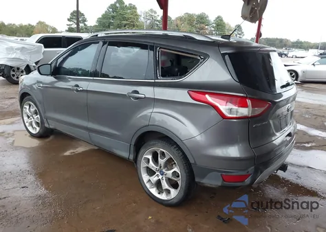 2014 Ford Escape Titanium z USA, uszkodzony, nr VIN 1FMCU9J92EUA69822
